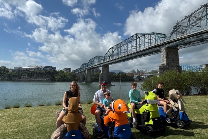 a group of people on a bridge
