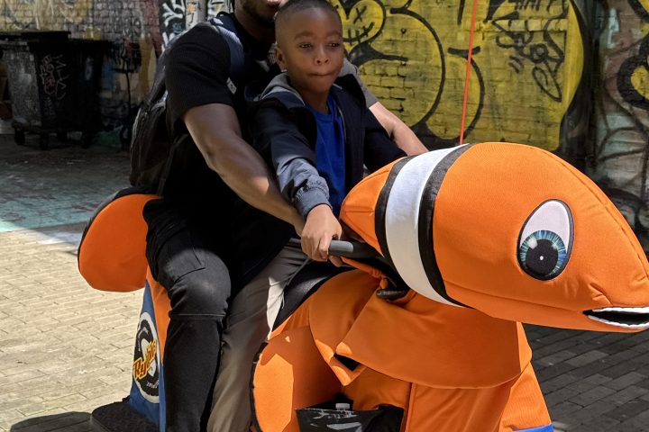 a man and a woman sitting on a bench