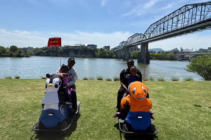 a group of people on a bridge